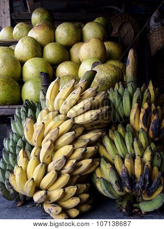 Fresh bananas and pomelo fruits