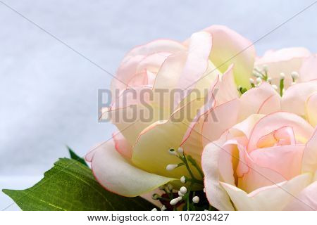 Pink Artificia Flower On White Cloth Background