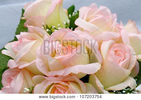 Pink Artificia Flower On White Cloth Background