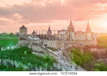 View on the castle in Kamianets-Podilskyi in the evening. Ukraine