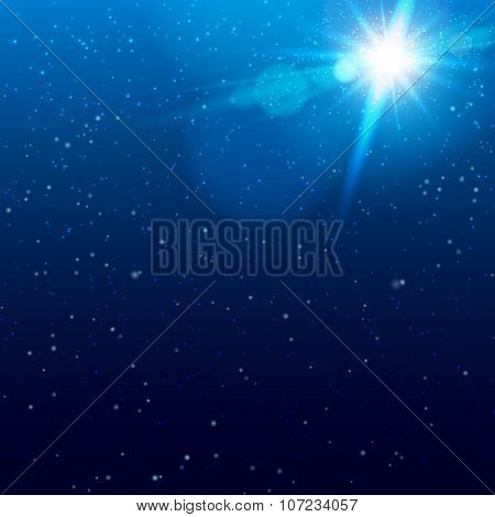 Sky with flecks of sunlight, snow