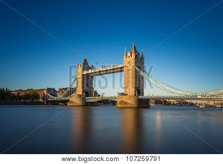 The iconic Tower Bridge at sunset with clear blue sky, London, UK