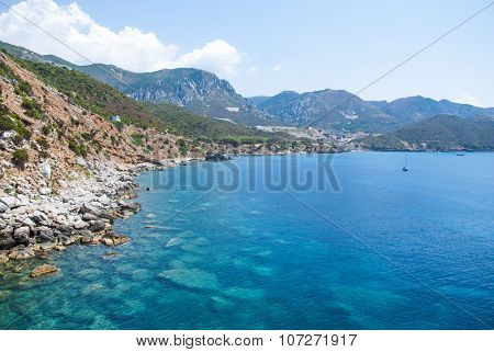 Coastal Landscape. Masua's Sea Stack Daily In Summertime (sardinia-italy)