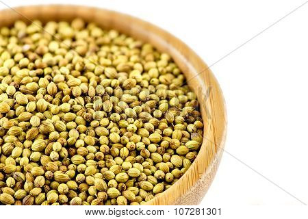 Studio Macro Of Coriander Seeds In Wooden Bowl