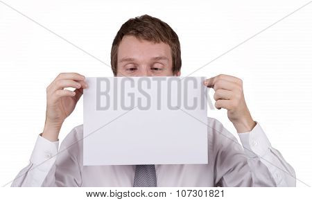 Office worker holding blank piece of paper