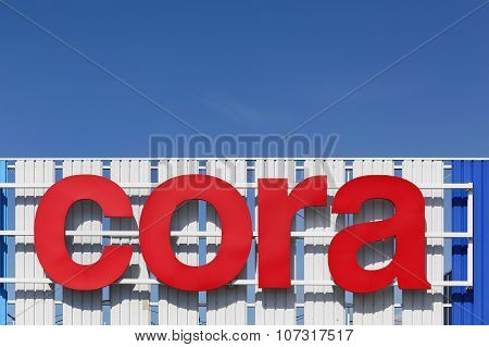 Cora sign on a facade