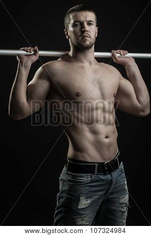 Muscular Man With Crossbar