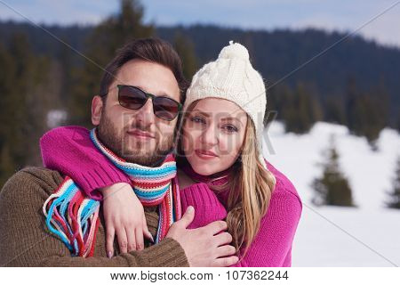 portrait of happy young romantic tourist  couple outdoor in nature at winter vacation