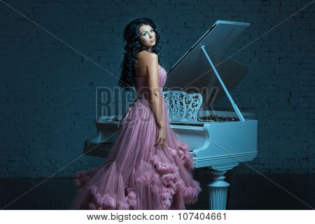 Girl And A Big White Piano.