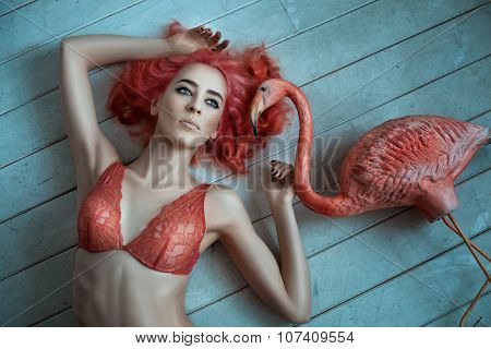 Girl With Red Hair Lying Naked On The Floor.
