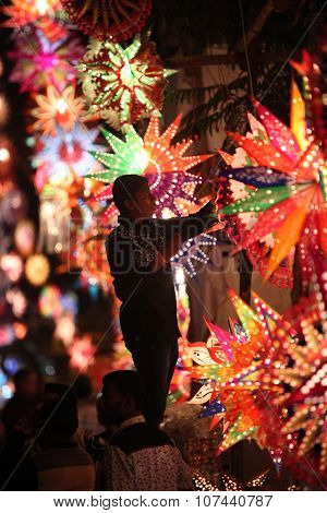 Pune, India - November 7, 2015: A Man Arranging Sky Lanterns In His Streetside Shop On The Occasion