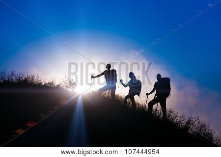 Three people family silhouettes on vacation