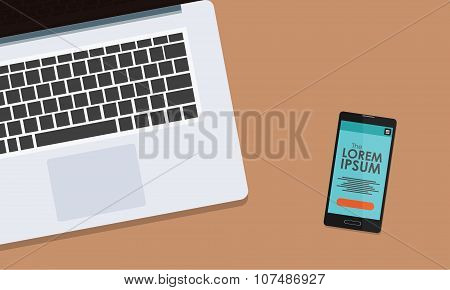 Smartphone and notebook on the desk. Top view
