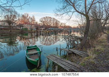 green boat on the parking