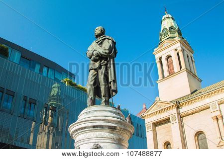 Monument of Croatian poet Petar Preradovic on Preradovic square (Flower square) and Serbian orthodox