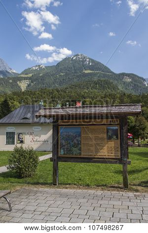 KOENIGSSEE, GERMANY - AUGUST 13, 2015: Exhibition building as a contribute Romy Scheider a famous actress with the mountains around the Koenigssee in the background