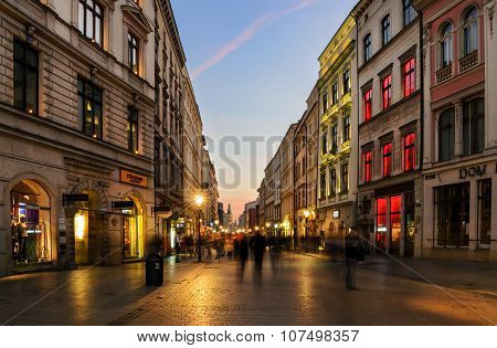 People Walk By Florianska Street In Krakow