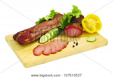 Still life - sausage on the board isolated