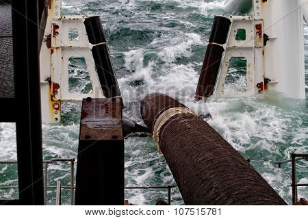 Descent Of A Pipeline To  Bottom Exhausting With The Pipelaying Barge