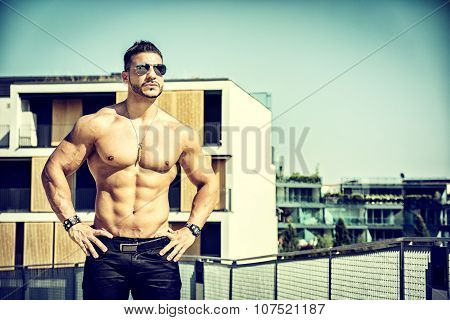 Handsome Muscular Shirtless Hunk Man Outdoor in City