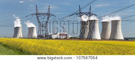 Power Plant Dukovany With Golden Rapeseed Field