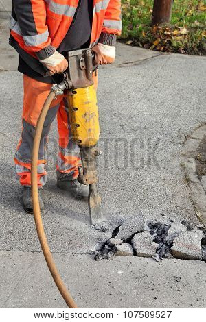 Asphalt Demolishing, Worker And Jackhammer