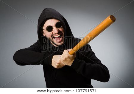 Aggressive man with basebal bat 