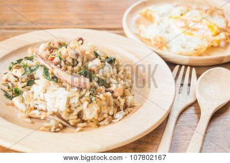 Rice Topped With Stir-fried Squid Basil And Fried Egg (thai Food)