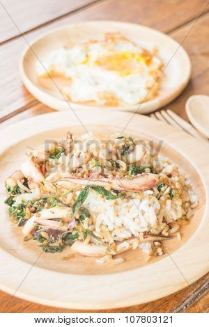 Rice Topped With Stir-fried Squid Basil And Fried Egg (thai Food)