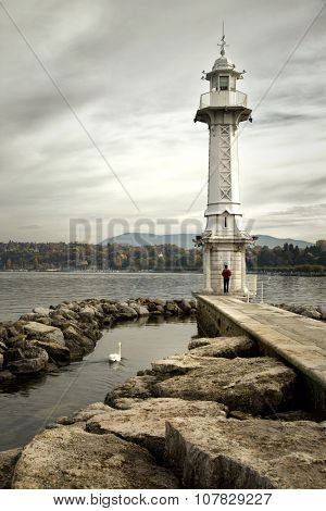 Les Paquis Lighthouse in Geneve, Switzerland during fall season