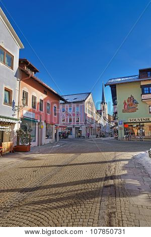 GARMISCH-PARTENKIRCHEN GERMANY - JANUARY 06 2015: Cozy street of Garmisch-Partenkirchen Bavaria Germany. The town well known for the beautiful facade paintings on the wall of the houses and shops
