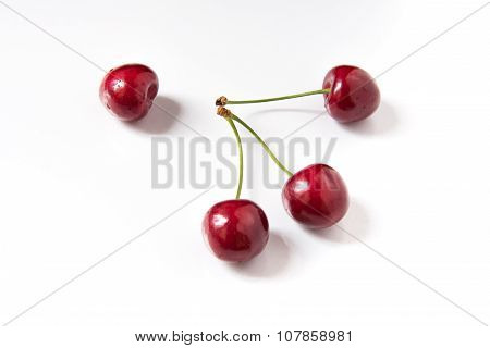 Bowl Of Red Fresh Cerries On A White Background