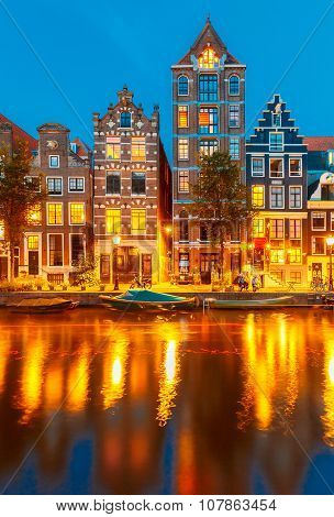 Night city view of Amsterdam canal Herengracht