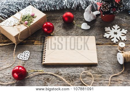 Cute vintage christmas new year gifts mock up on wooden background.