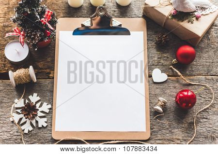 Cute vintage christmas new year gifts mock up on wooden background.