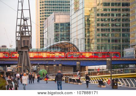 LONDON, UK - SEPTEMBER 9, 2015: DLR train running through the  Canary Wharf business and banking ari