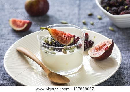 Greek Yogurt With Fig ,mulberries And Pumpkin Seed