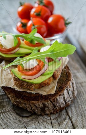 Avocado mozzarella and tomato bruscetta