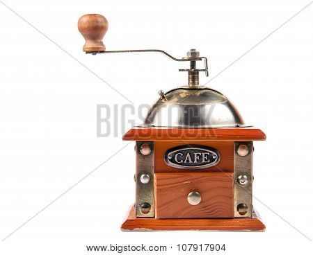 Photo Of An Antique Coffee Grinder On White