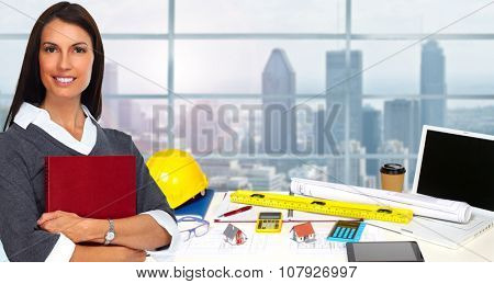 Woman architect in amodern office. Construction and renovation concept.