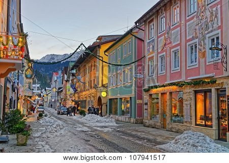 GARMISCH-PARTENKIRCHEN GERMANY - JANUARY 06 2015: Christmas mood in Garmisch-Partenkirchen Germany. Streets of the town illuminated and decorated for the winter holidays