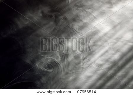 Light and smoke proceeds to the room through an open window