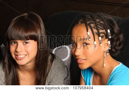 cute African American girl and Caucasian girl friend