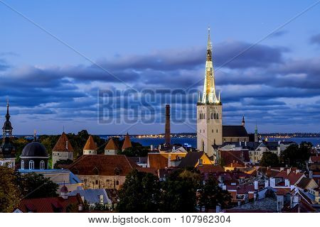 View Of The St. Olaf Cathedral  In Old Tallinn At Sunset . Estonia
