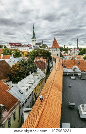 View Of St. Olaf  Cathedral And The Streets Of Old Tallinn City Wall.