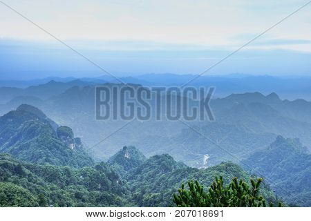 The Wudang MountainsHubei China. Many Taoist monasteries to be found thereIt's world heritate and famous in one of China. This here have a good weather sometime it a lot of the fog.