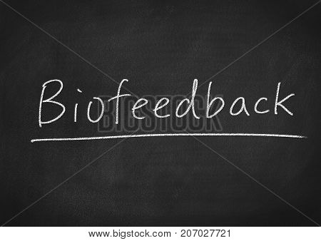 biofeedback concept word on a blackboard background