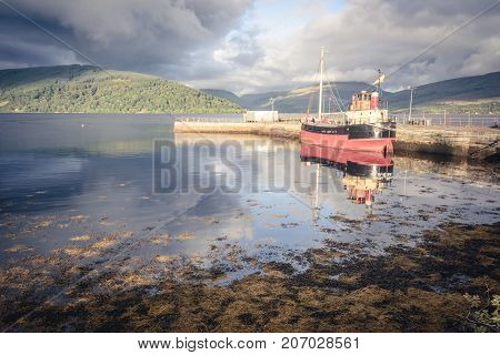 Sunset And Boat On Loch Fyfe At Inveraray, Scotland