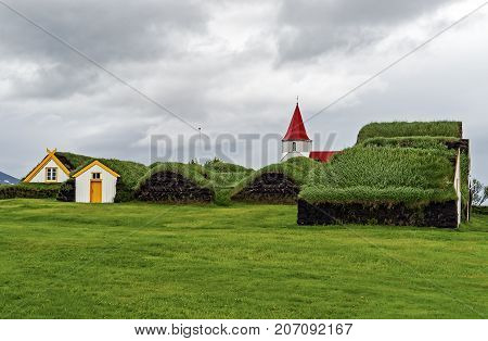 Farm Museum in Glaumbaer - Iceland. Picturesque village of old houses covered with turf and grass.