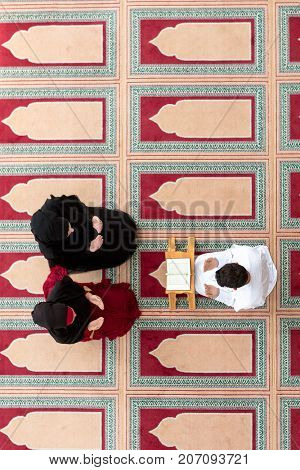 Muslim girl and the man marry by Muslim traditions.